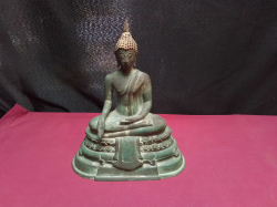 An Old Buddha Statue. W.20 H.23 Cm.