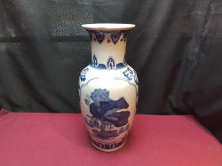A large blue and white Chinese vase. W.19 H.42 Cm.