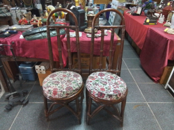 A Nice Pair of Upholstered Rattan Chairs with Cushions.