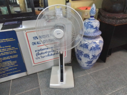 A White Hatari Slide Smart Fan 18 inches and a digital interface with remote control. 