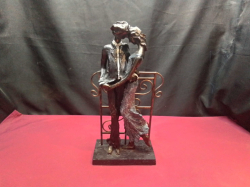 A Resin and Metal of Couple Statue. W.9 L.18 H.37 Cm.