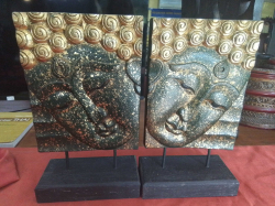 2 Buddha Plagues with gold gilt.W.10 L.20 H.35 Cm.