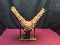 A Handcrafted model of a Tongkonan, the traditional ancestral house of the Toraja People in South Sulawesi, Indonesia. W.36 H.42 Cm.