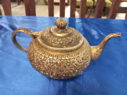 A Silver plated of  Thai Tea Pot.  L.22 W.13 H.10 Cm. 