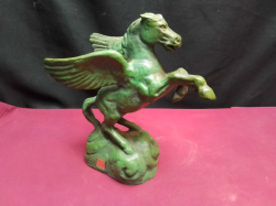A bronze flying horse stamped. W.8 L.12 H.23 Cm.