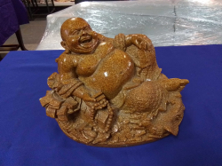 A Heavy Happy Buddha in Repose. W.18 L.28 H.20 Cm.