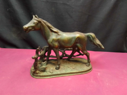 A Vintage cast iron horse. W.11 L.28 H.20 Cm.