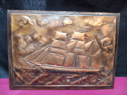 A  Vintage Copper Sheeting Art Picture featuring a sailing Ship in ocean. 22x31 Cm.