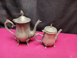 2 Silver Plated tea pots.