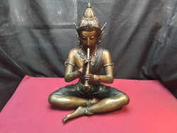 A large mint condition solid bronze sculpture cold cast of an angel Buddha playing music 39x47 Cm. weight 7.9 Kg. Beautiful item 