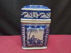 A large chinese blue and white lidded tea  caddy with good mark to base. W.9 L.13 H.19 Cm.
