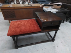 A pretty oak telephone table. 