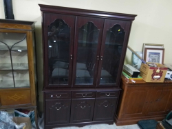 A 3 door bookcase with etchet glaes doors. W.42 L.127 H.192 Cm.