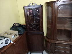 A standing mahogany corner cupboard. W.68 D.38 H.187 Cm.