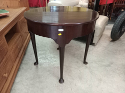 A Queen Ann style mahogany demi lune tea or card table probably victorian on cabriole legs. W.75 L.77 H.69 Cm.
