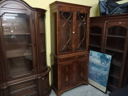A lovely yew wood bookcase with astragal glazed top and cupboard base. W.93 D.37 H.200 Cm.