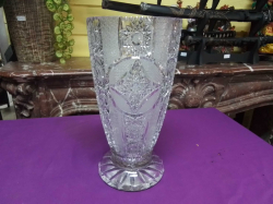 A large heavily cut glass vase in English or Irish Crystal. W.16 H.31 Cm.