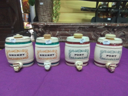 4 Miniature spirit barrels 2 ports and 2 sherry. W.10 H.13 Cm.