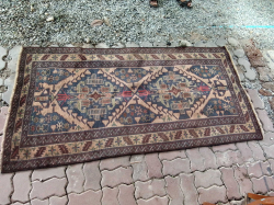 A Lovely Persian Balauch Handmade Carpet. 107x208 Cm.