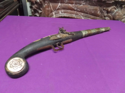 A Replica Arabian Long Barreled Pistol with Bone and Brass inlay. L.53 Cm.