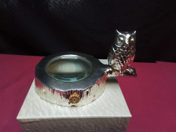 A high quality silver plated design by Owl magnifier glass. W.11 H.6 Cm.