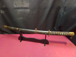 A special made samurai sword marked on stand. L.74 Cm.