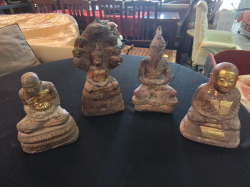4 Statues resemble antique pottery or terracotta figures, with one featuring a Buddha sheltered by a Naga hood.