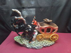 A vintage glazed ceramic figurine from H. Bequet Quaregnon in Belgium. W.14 L.44 H.33 Cm.