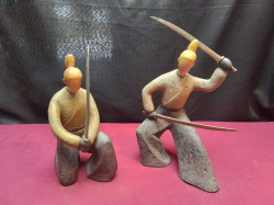 A pair of heavy stone Samurai fighting warriors, standing one W.17 H.27 Cm.