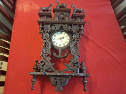 Vintage-style carved teak wooden wall clock