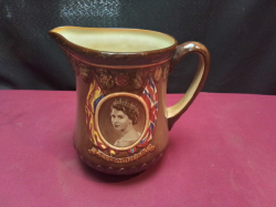A stunning 1953 Royal Doulton Coronation of Elizabeth II Westminster Abbey jug (6 inches high)