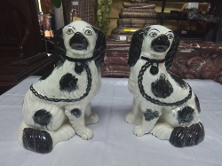 A Good Pair of Staffordshire  Spaniels with open front feet.W.17 D.11 H.24 Cm.