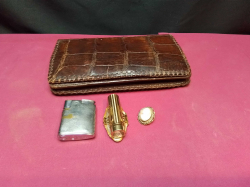 An old Ronson Lighter A1950, Lip stick holder, A Crocodile purse Paris 1930 and cameo brooch. 
