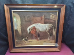 A lovely oil paint off of horses and a dog signed.69x62 Cm.
