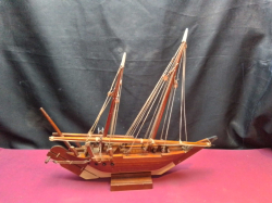 A Vintage carved wood Traditional trading vessel. L.40 H.37 Cm.