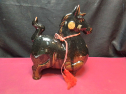 A green glazed ceramic horse Decanter. W.11 L.24 H.27 Cm.