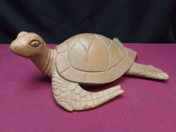 A vintage carved turtle. L.32 W.21 H.12 Cm.