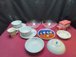 A massive job lot of 12 items of snoopy ceramics and a biscuit tin