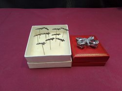 A Butterfly Brooch and Day Pins.