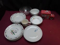 A massive job lot of 24 items snoopy ceramics plates, bowls, mugs and a biscuit tin 