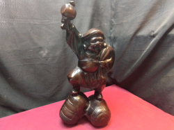 A Japanese Heavy Metal Lucky Figure. H.53 W.23