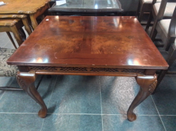 A Lovely Mahogany coffee table with an open work freeze on Queen Ann legs