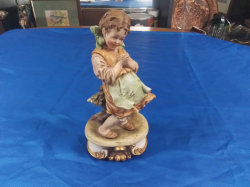 A Good signed Capodimonte Figure of achild by 