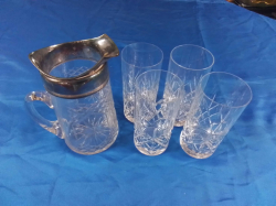 A good cut glass Jug with silver plate rim and 4 cut glass beer glasses
