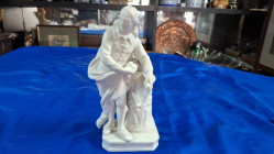 A Parian figurine group of a Scholar. H.26 cm