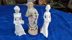 3 Porcelain and bisque figurines. H.27 cm