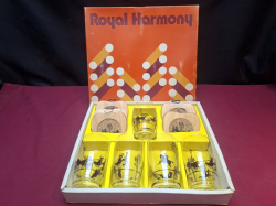 A boxed set of 5 Royal Harmony glasses with matching coasters all decorated with coach and horses