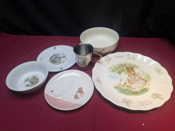 a job lot of 6 items of ceramic rabbit decrated items.A large plate decorated for the  french market.Two side plates the world of peter rabbit. A bowl the world of peter rabbit. A large bowl decorated with rabbits. A cup the world of peter rabbit