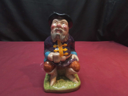 A rare H.Wain and sons Melbaware toby jug The tale teller 8.5