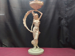 A Tall white standing lady 
H.50 cm.
W.15 cm.
